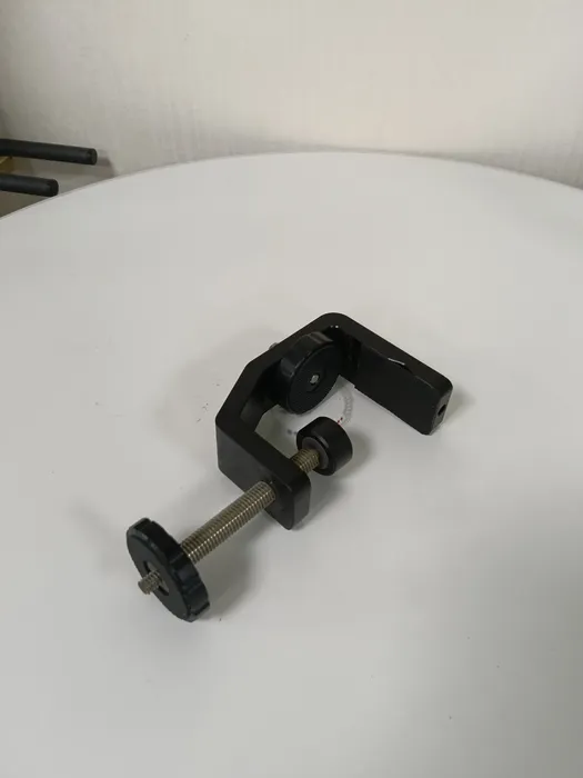 C1 Bench Clamp in black, three-quarter view with the screw extended