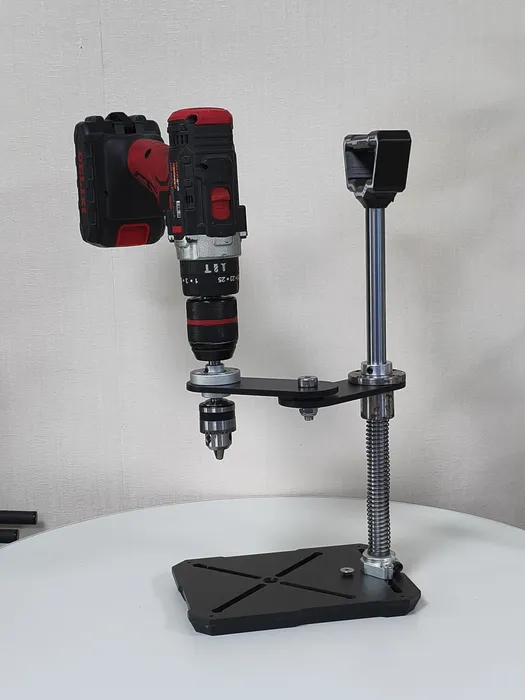 The same station with a cordless drill clamped in place